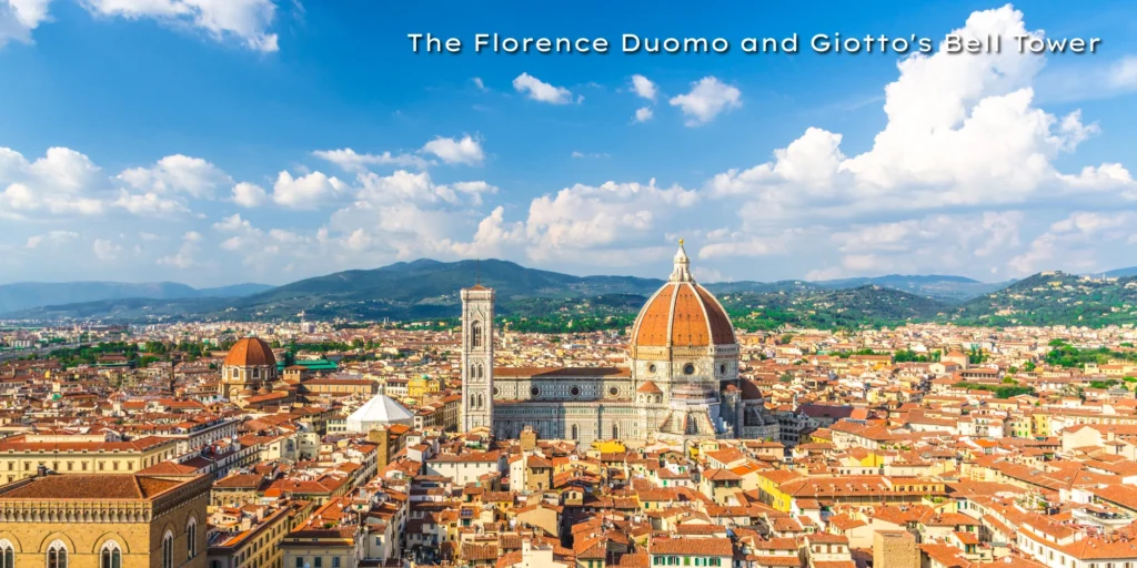 The grand terracotta dome of the Florence Cathedral standing next to the tall, ornate Giotto's Bell Tower.
