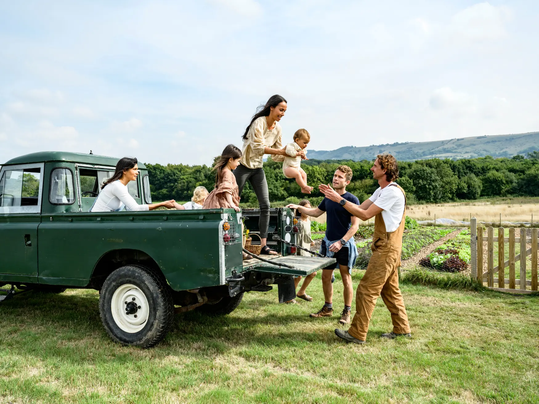 Family laughing together during a nature holiday
