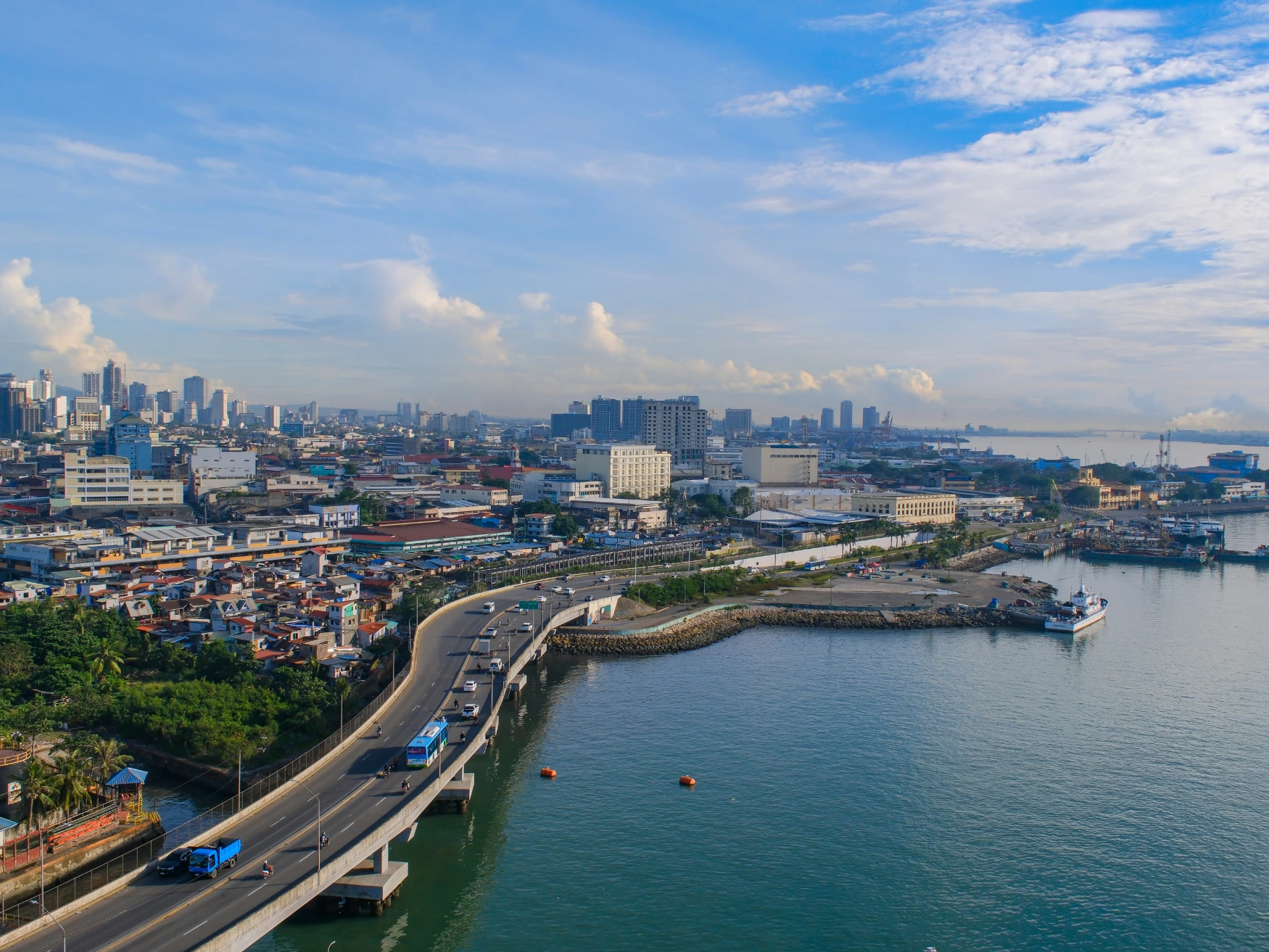 Cebu City waterfront, road bridge and urban skyline in the Philippines