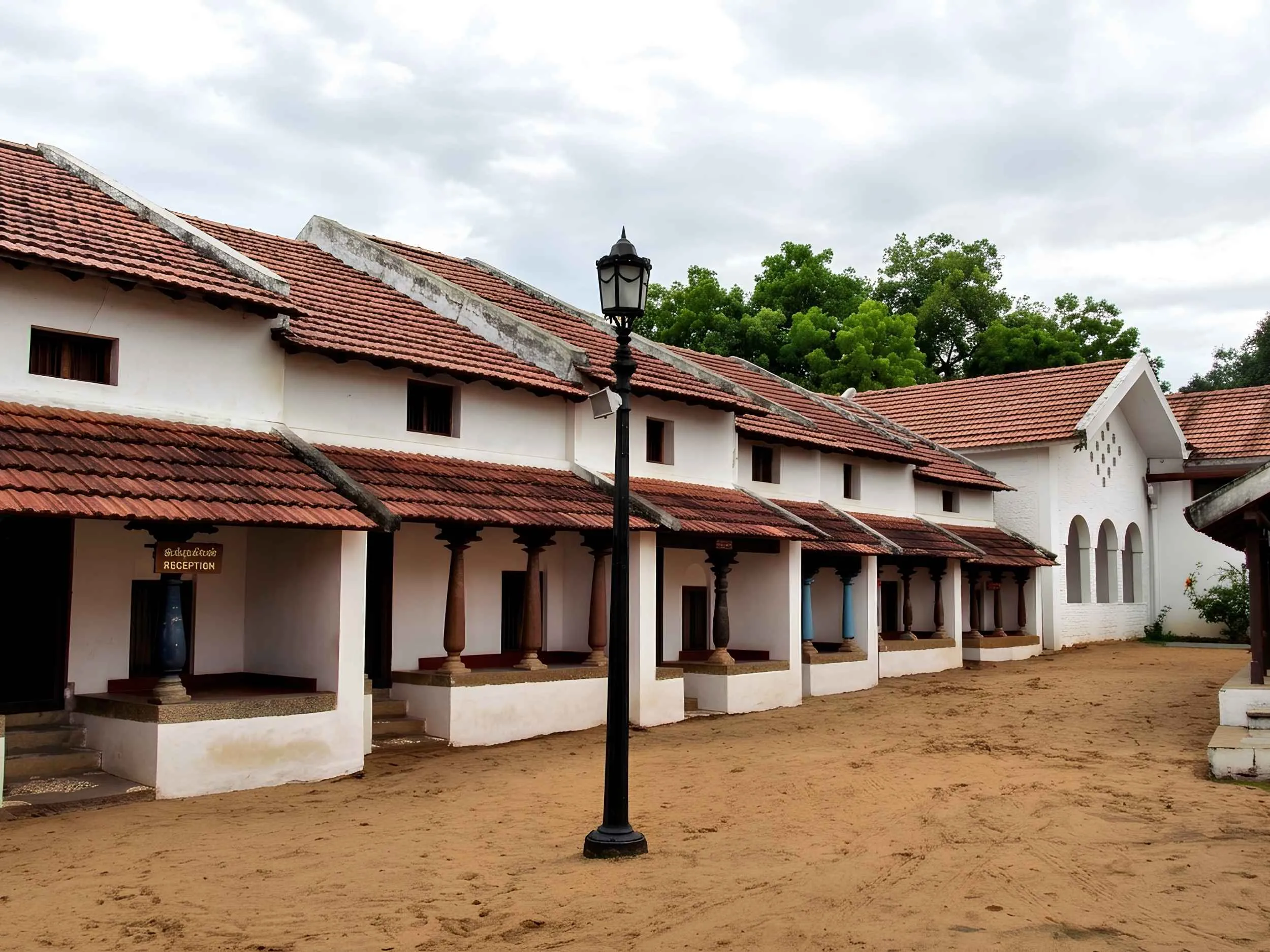 Restored traditional South Indian courtyard houses and tiled roofs at DakshinaChitra Heritage Museum Chennai