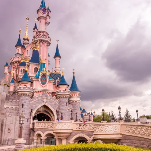 Sleeping Beauty Castle at Disneyland Paris during a family European tour package from Chennai.