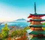 Japan travel guide hero panorama featuring Chureito Pagoda, Mount Fuji, cherry blossoms, and Kyoto heritage architecture