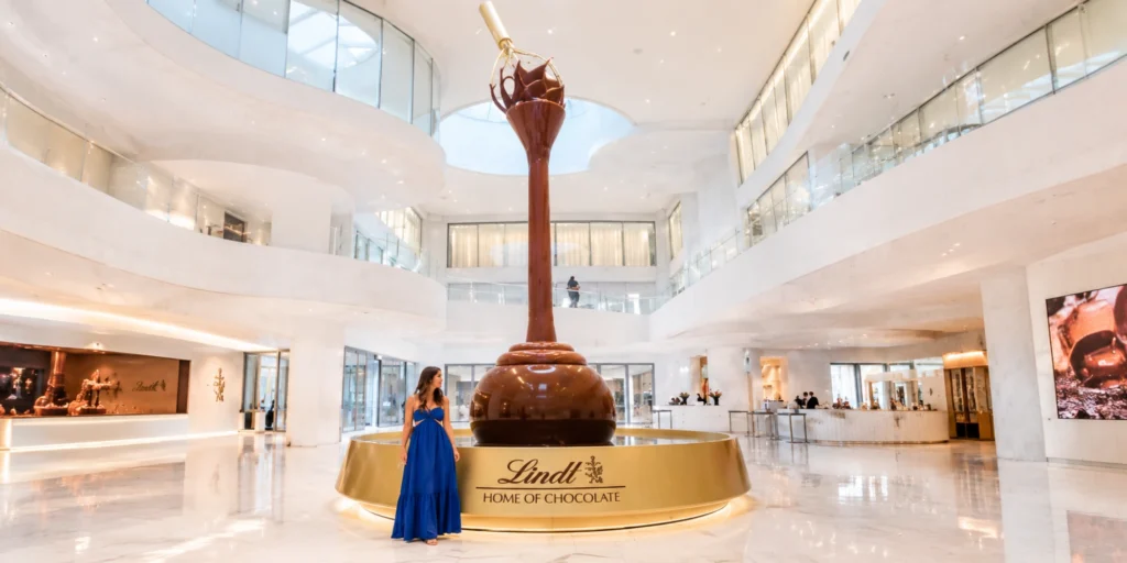 Flowing nine-meter chocolate fountain at Lindt Home of Chocolate museum in Zurich.