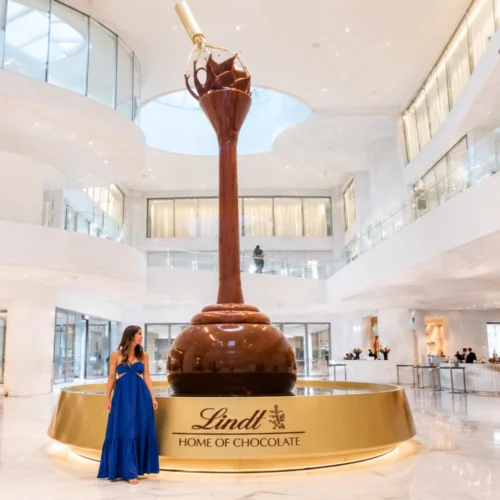 Flowing nine-meter chocolate fountain at Lindt Home of Chocolate museum in Zurich.