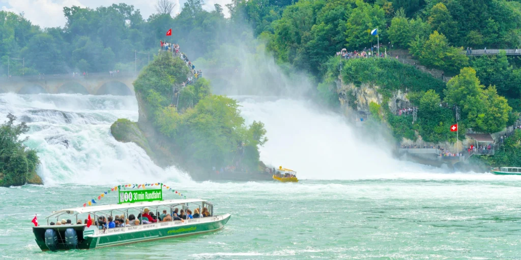 Powerful cascading waters of the Rhine Falls near Schaffhausen during a Zurich day trip.